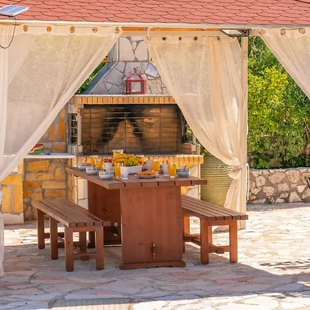 Kefalonia View Апартаменты Каравомилос